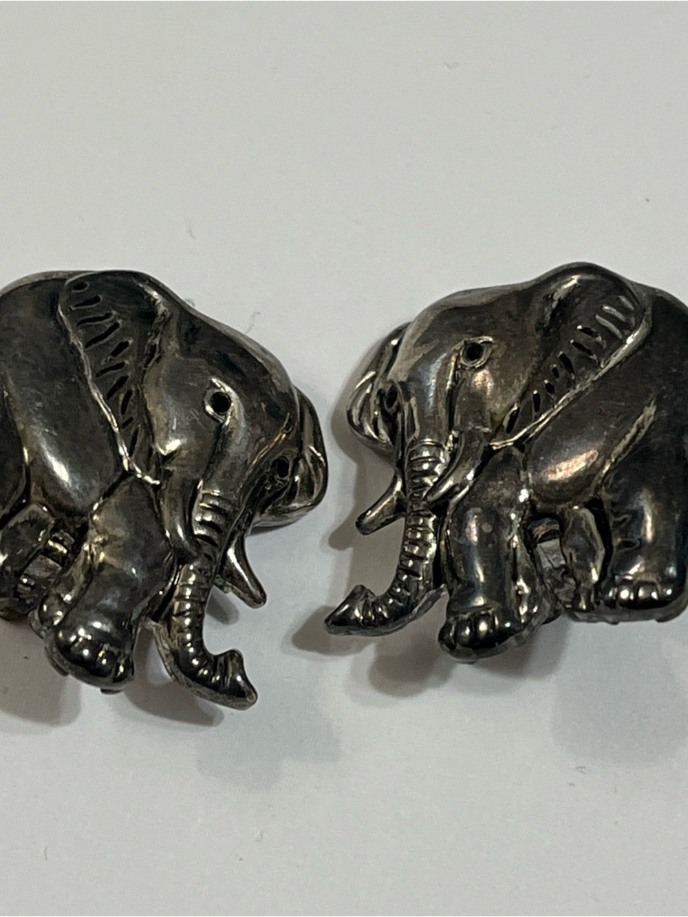 Elephant Silvertone clip earrings trunk up
